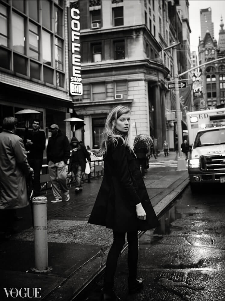 A fashion figure in a long gown on a New York street.