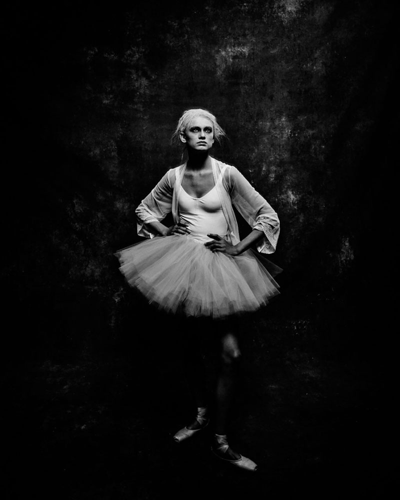 A dancer in a poised ballet study.