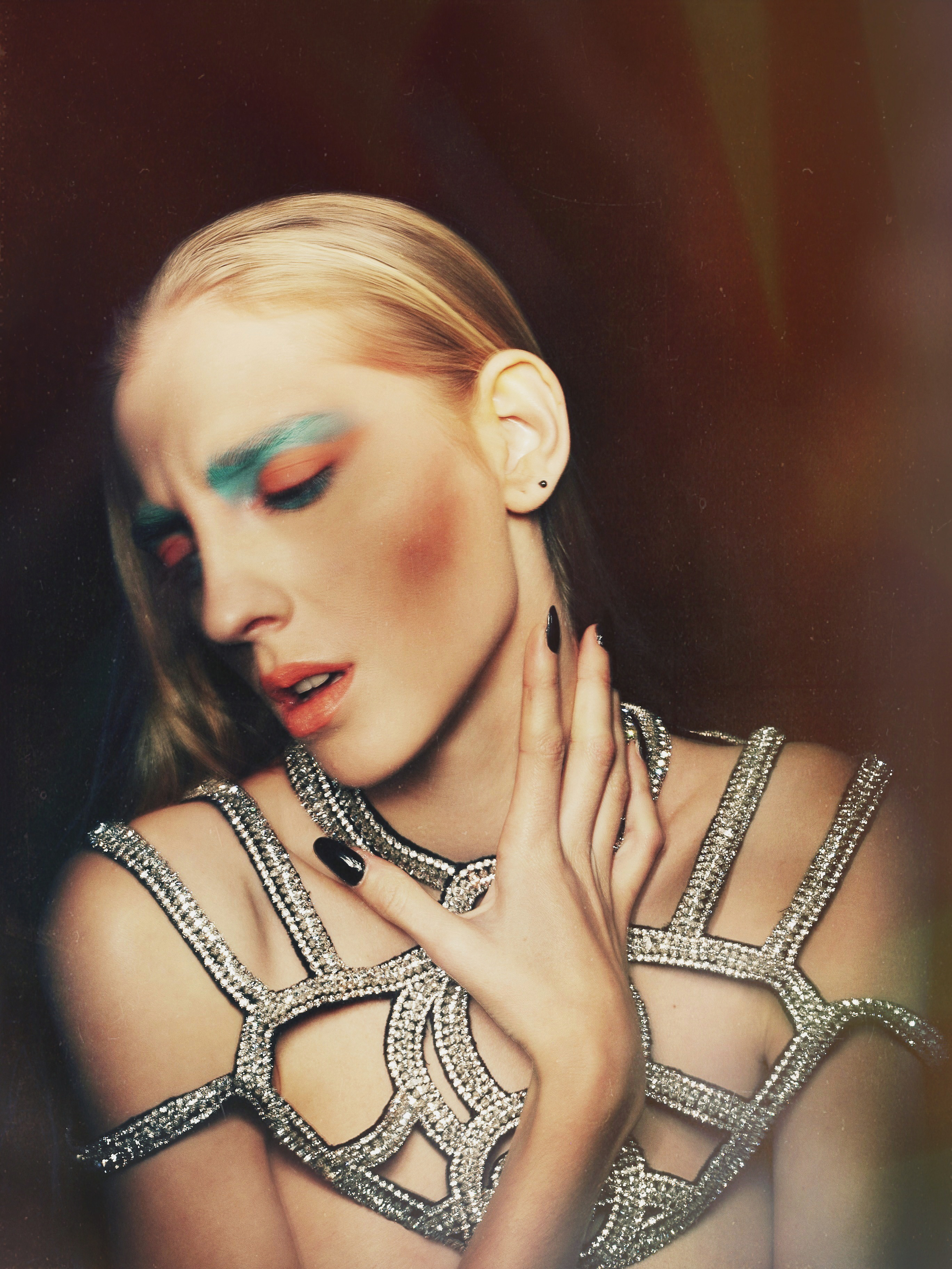 A fashion portrait with a luminous hand-painted light trail.