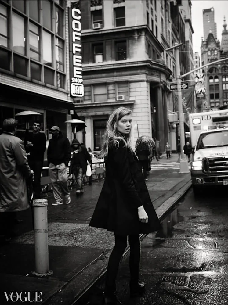 A fashion figure in a long gown on a New York street.